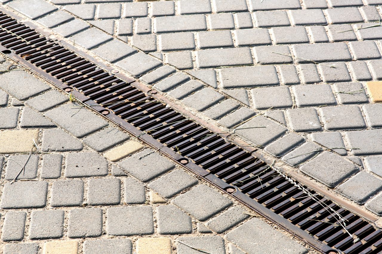 The Challenge of Low Head Drainage Andy’s Sprinkler, Drainage & Lighting